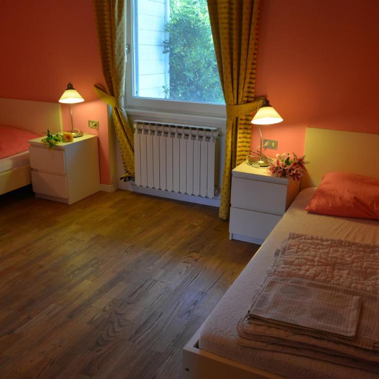 Casa del Sole - Appartamento con 2 Camere da Letto e Giardino Privato - 8