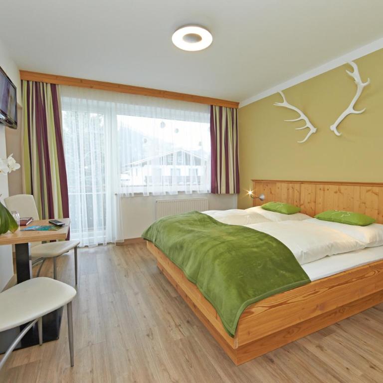 Comfort Hotel Garni Landhaus Gitti - Familien-Vierbettzimmer mit Balkon - 2