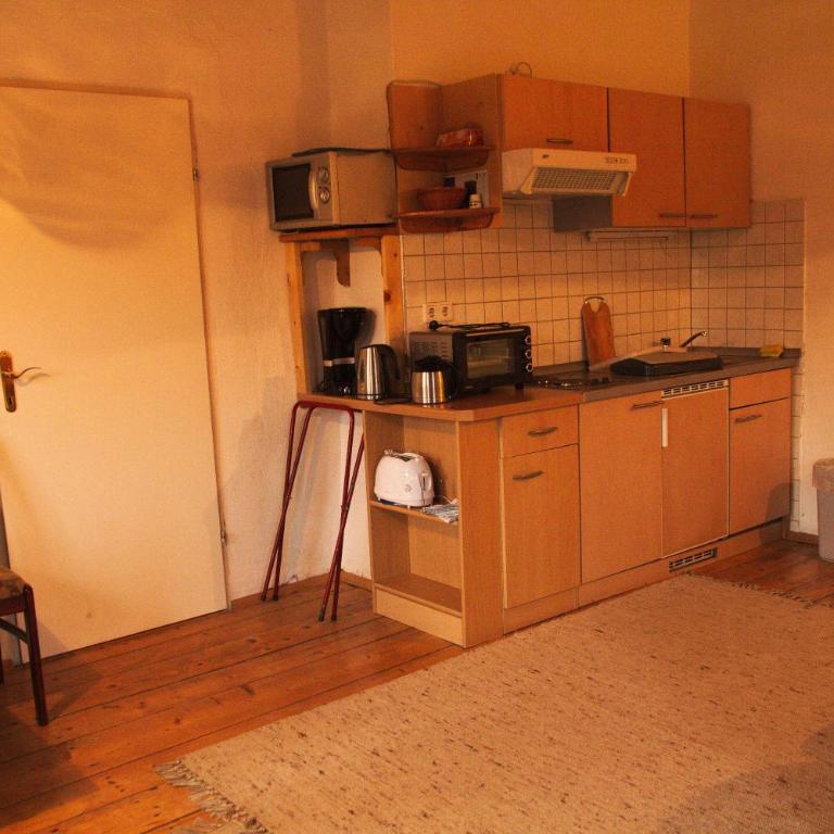 Pension Eckschlager - Familienzimmer mit Gartenblick - 8