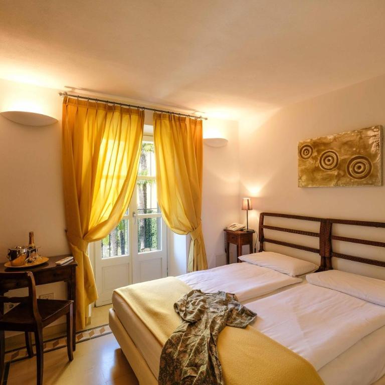 Albergo Milano - Camera Matrimoniale/Doppia con Letti Singoli con Vista Lago Parziale - 7