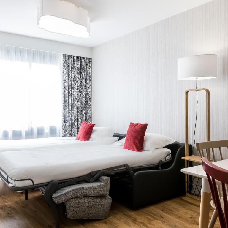 Madame Cadet - Appartement – Bâtiment 2 - 18