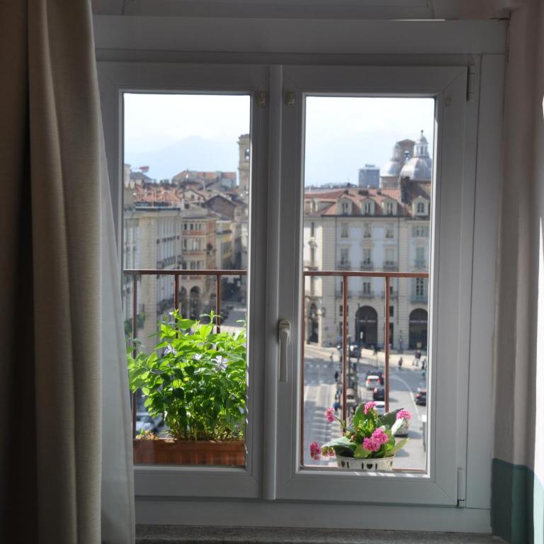 Mansarda in Piazza Castello - Appartamento Monolocale - 24