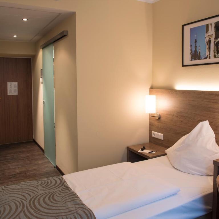 Hotel Schlicker - Standard Einzelzimmer mit Dusche und Klimaanlage - 1