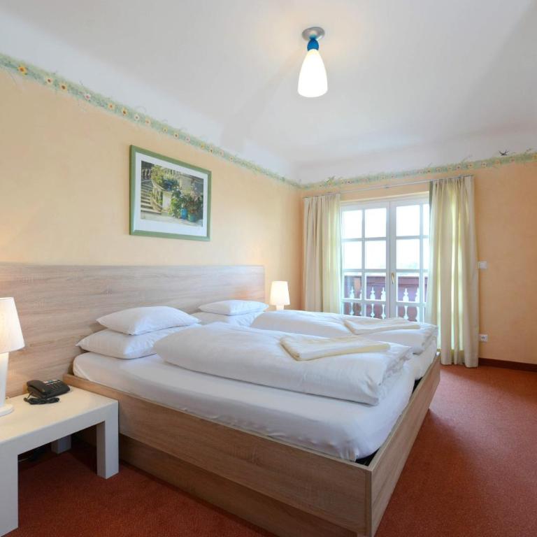 Lust und Laune Hotel am Wörthersee - Großes Doppelzimmer mit Balkon und Seeblick - 9