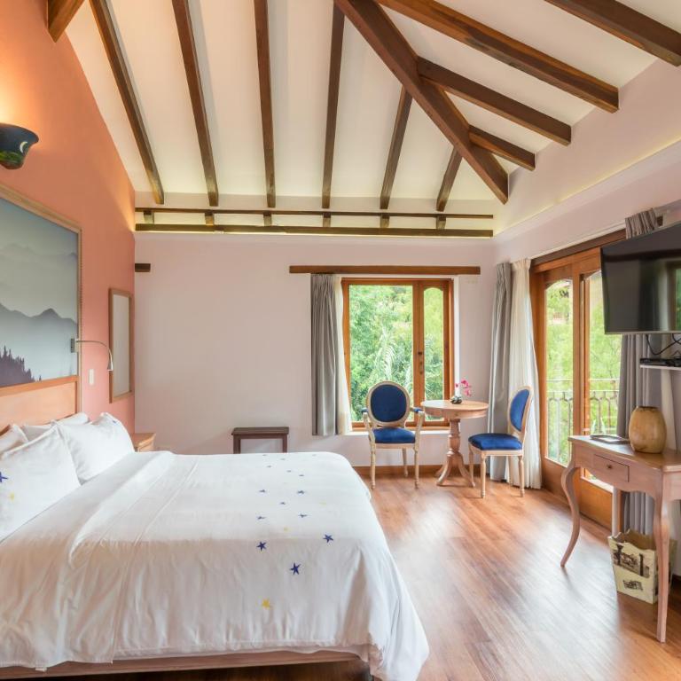 La Casa Del Arbol Hotel Boutique Villa de Leyva - Habitación con cama grande y bañera de hidromasaje - 2