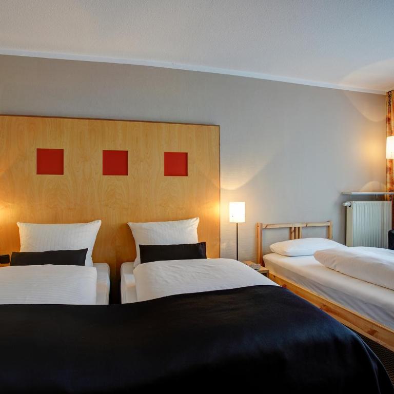 Hotel Noris City Nürnberg - Familienzimmer mit 1 Doppelbett und 1 Einzelbett - 3
