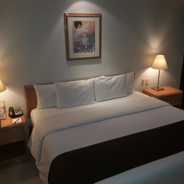Hotel PF - Habitación Estándar - Cama extragrande - 21