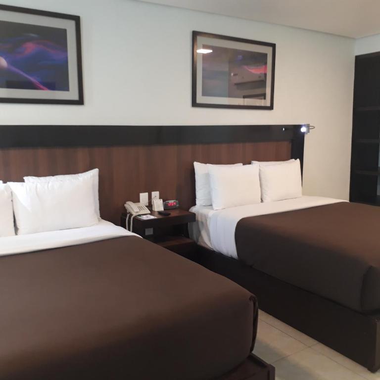 Hotel & Suites PF - Habitación Doble Deluxe - 13