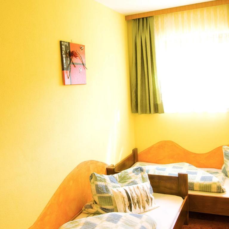 Gästehaus Götz - Doppelzimmer mit Balkon - 12