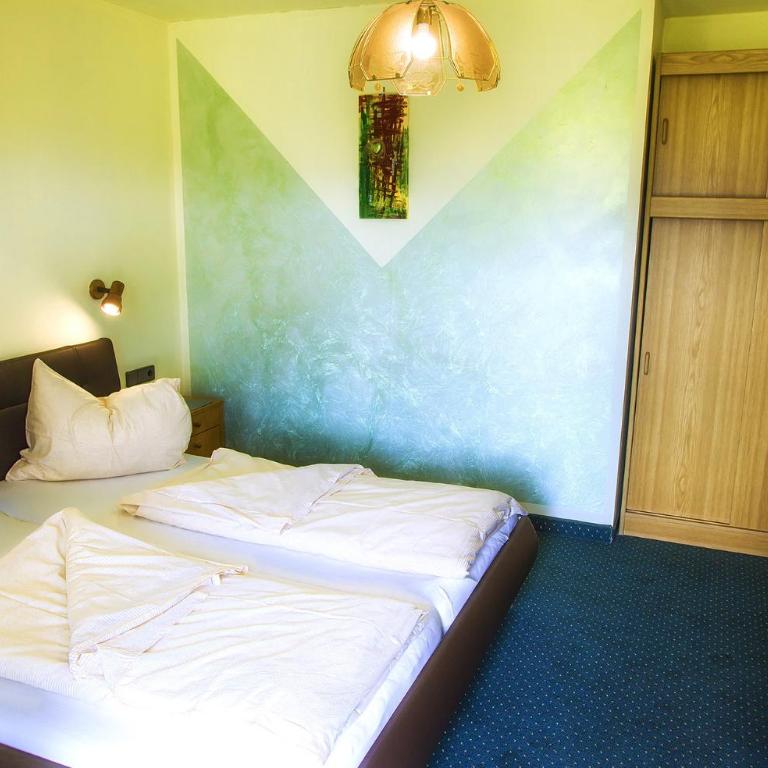 Gästehaus Götz - Doppelzimmer mit Balkon - 7