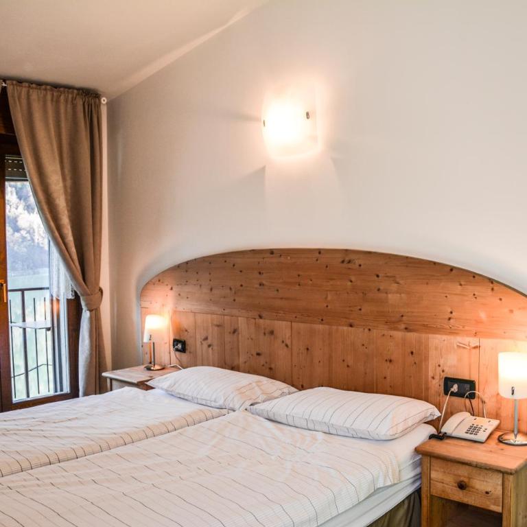 Albergo Mezzolago - Camera Matrimoniale/Doppia con Letti Singoli con Vista Lago. - 4