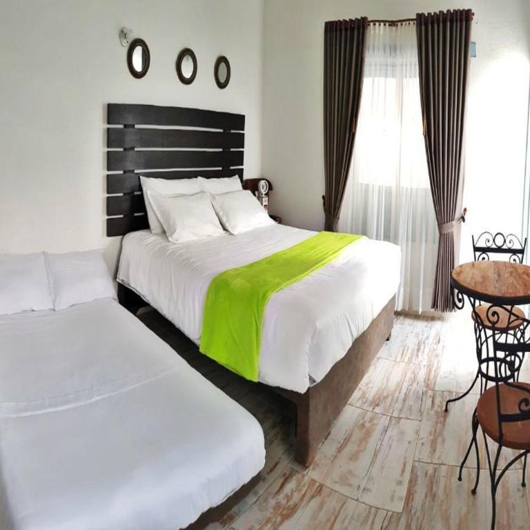 Casa Hotel Santa Helena Boutique - Habitación Doble Deluxe con cama supletoria - 22