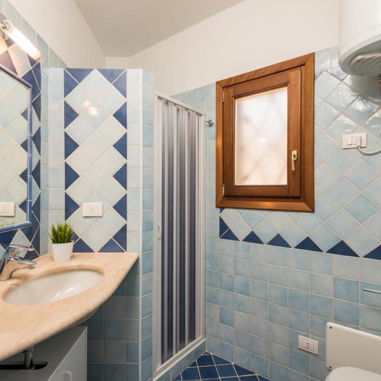 Villaggio Perlacea - Your House in Sardinia - Appartamento con 2 Camere da Letto, Terrazza Solarium e Vista Mare - 1