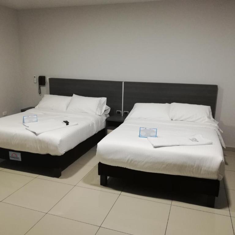 Hotel Doral Inn - Habitación Doble - 2 camas - 5