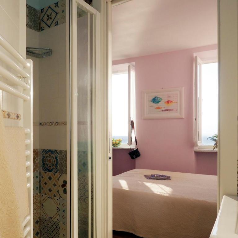 Ai Pesci Room Rental - Deluxe Doppelzimmer mit Meerblick - 17