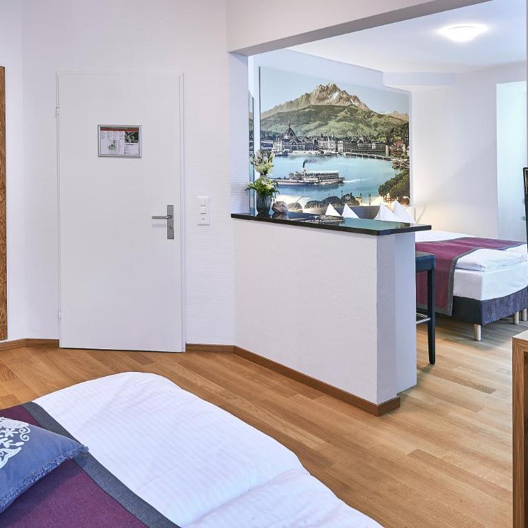 Hotel Central Luzern - Superior Familienzimmer - 10
