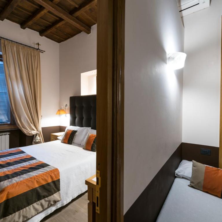 JR Suites - Camera Matrimoniale/Doppia con Letti Singoli con Letto Supplementare - 1