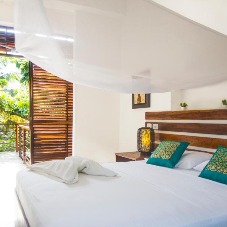 Makao Beach Hotel - Habitación Doble Deluxe con balcón y vistas parciales al mar - 9