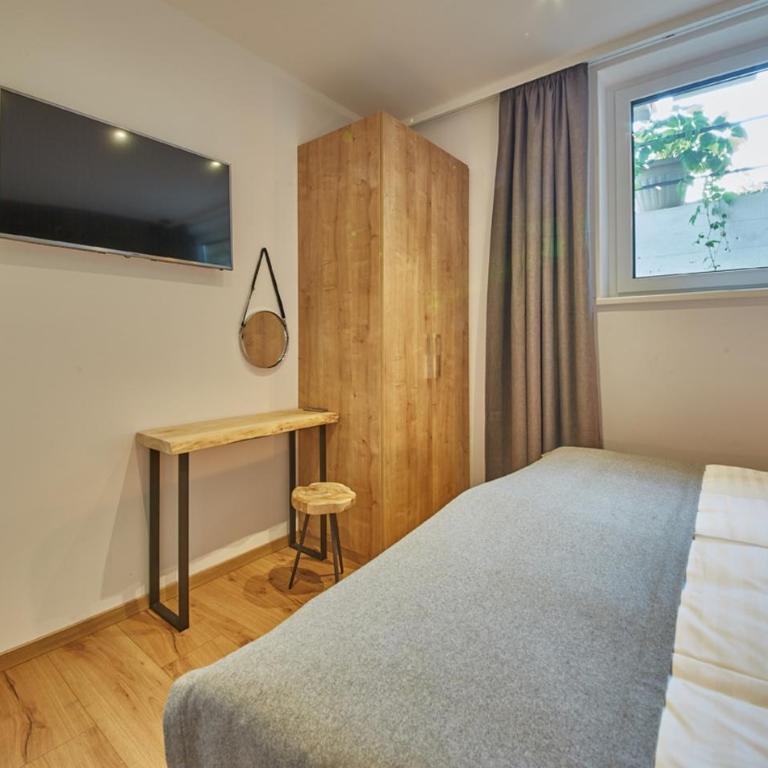 Appartements Der Fuchsbau - Apartment mit 2 Schlafzimmern im Keller - 60