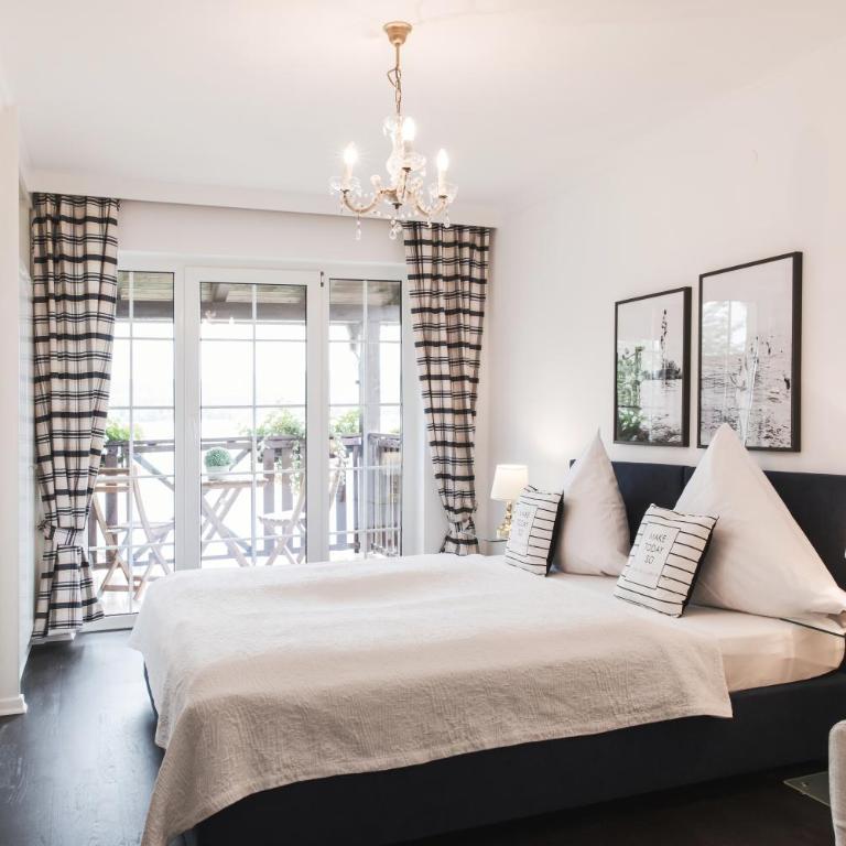 Strandhotel Sille - Familienzimmer mit Balkon und Seeblick - 8