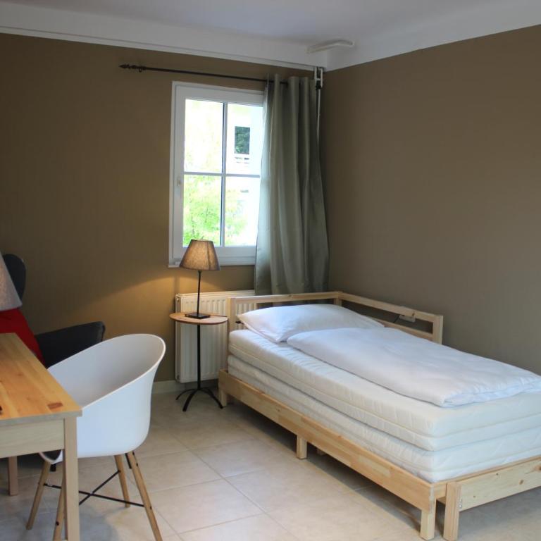 Blaues Haus Ferienwohnung Bodensdorf Ossiacher See Gerlitzen Alpe - Apartment mit Gartenblick - 11