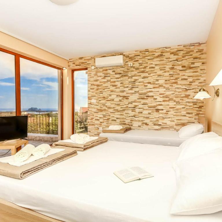 Jovan Apartments - Deluxe Triple Room with Sea View - 3