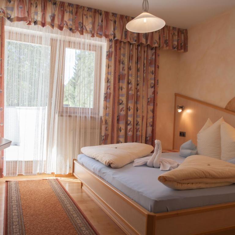 Haus Wulfenia - Doppelzimmer mit Terrasse - 9