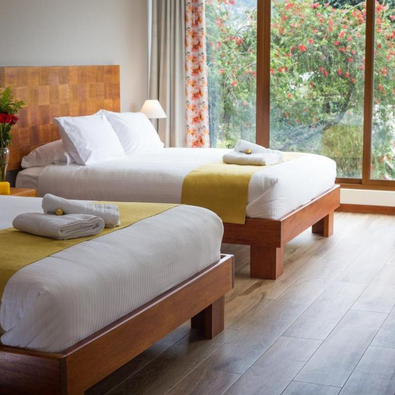 Ilalo Garden Hotel & Restaurant - Habitación Deluxe con 2 camas grandes - 3