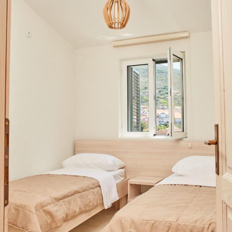 Apartmani Tripović - Apartman sa 2 Spavaće Sobe, Pogledom na More i Balkonom - 35
