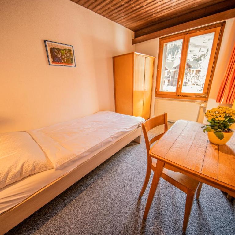 Sportchalet Mürren - Einzelzimmer mit eigenem Bad - 1