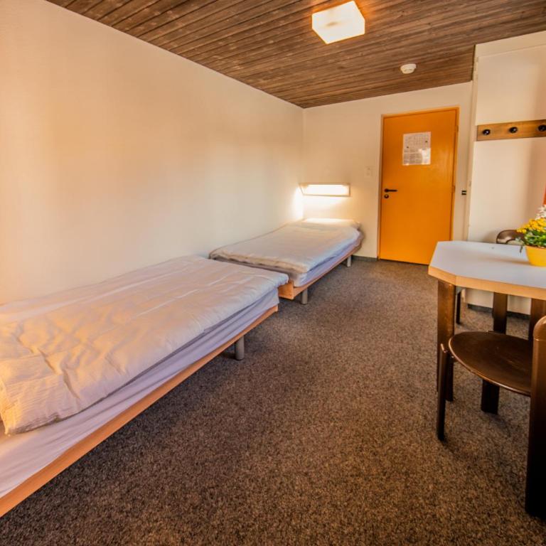 Sportchalet Mürren - Zweibettzimmer mit Gemeinschaftsbad - 2