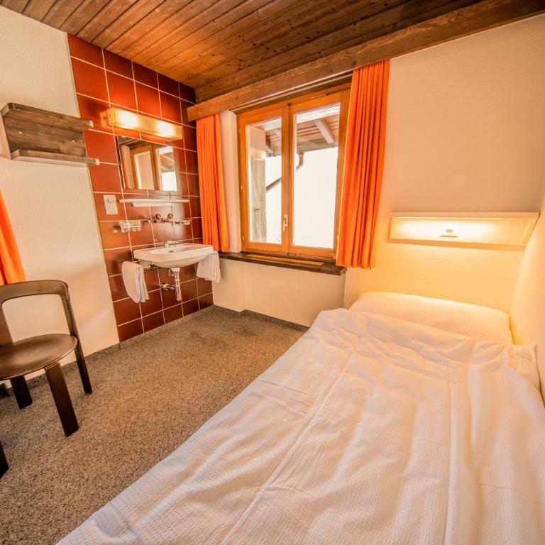 Sportchalet Mürren - Zweibettzimmer mit Gemeinschaftsbad - 4
