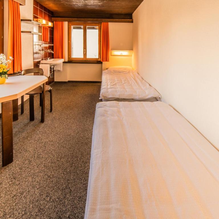 Sportchalet Mürren - Zweibettzimmer mit Gemeinschaftsbad - 5