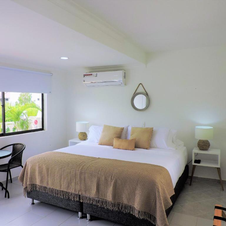 Mucura Hotel & Spa - Habitación Deluxe con cama extragrande - 13