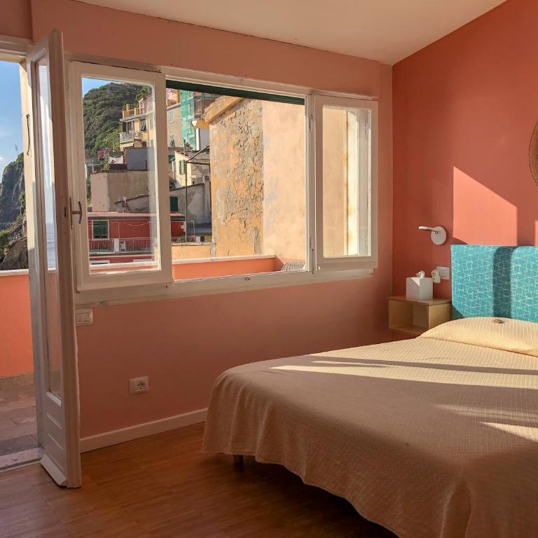 Ai Pesci Room Rental - Deluxe Doppelzimmer mit Balkon und Meerblick - 4