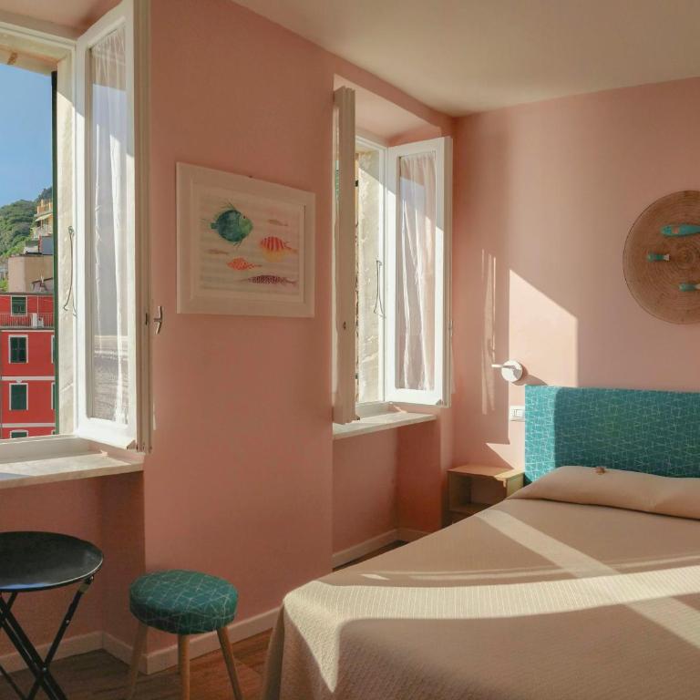 Ai Pesci Room Rental - Deluxe Doppelzimmer mit Meerblick - 1