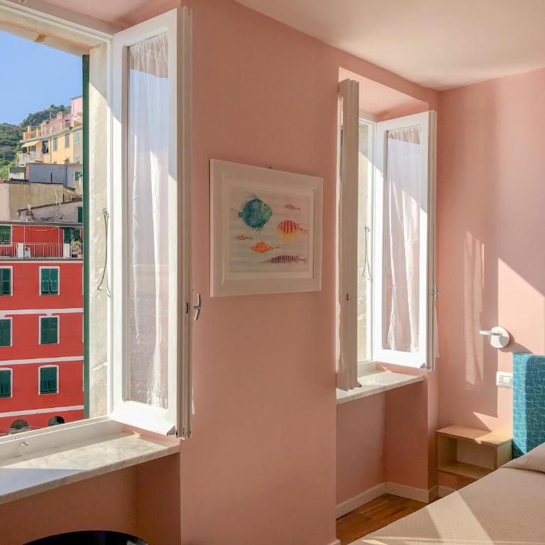 Ai Pesci Room Rental - Deluxe Doppelzimmer mit Meerblick - 4