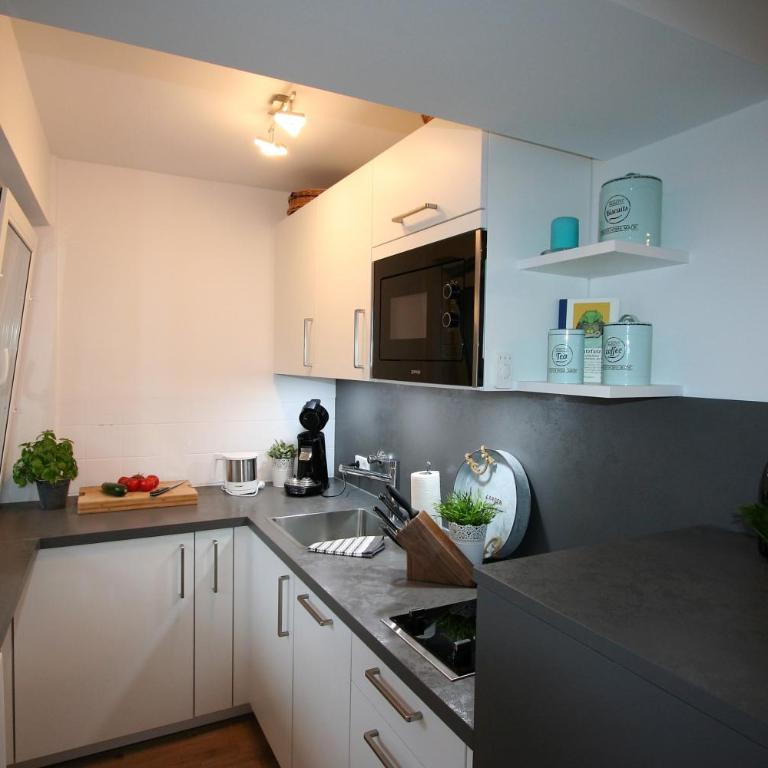 Alpenflair Ferienwohnungen Whg 106 - Apartment - 12