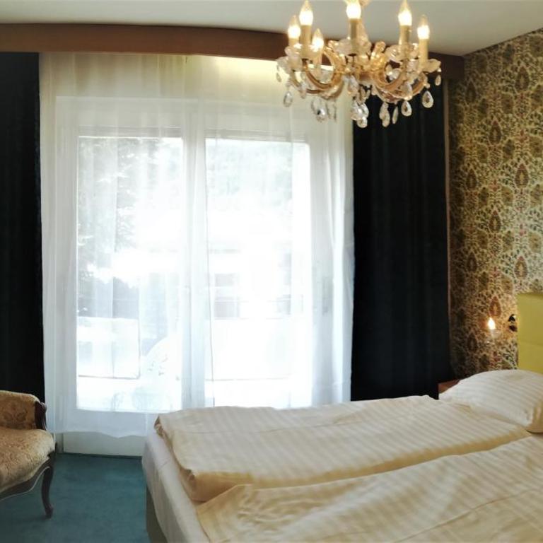 Villa Rauter - Doppelzimmer mit Balkon - 1
