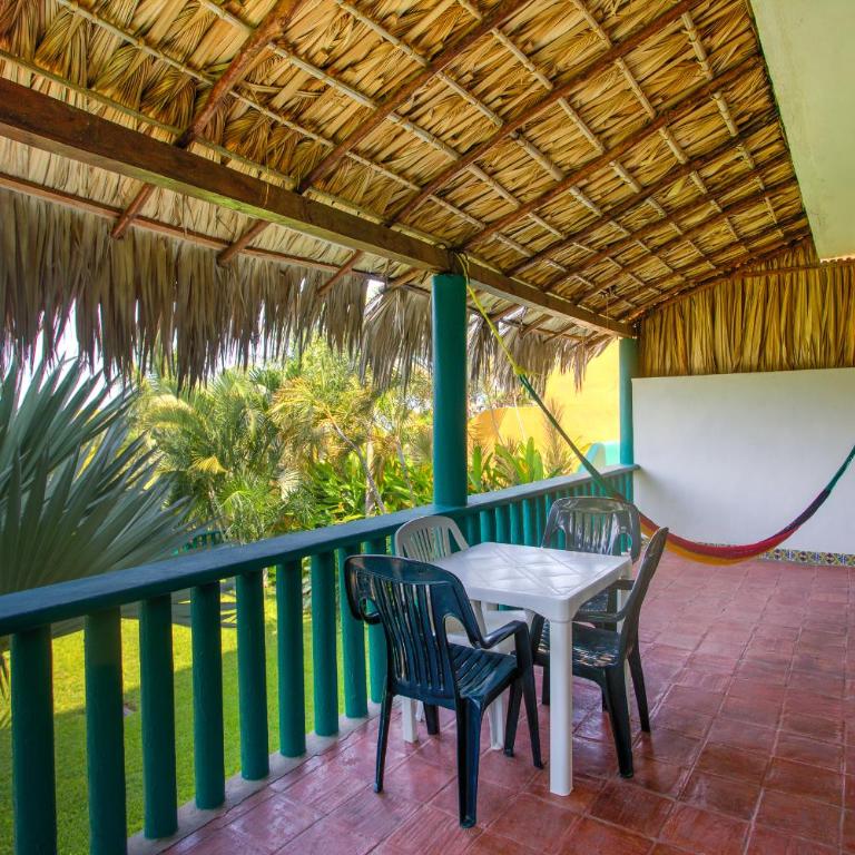Bungalows Oasis - Suite Deluxe con cama extragrande - 1