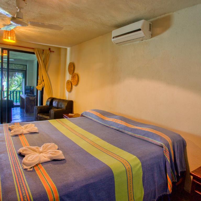 Bungalows Oasis - Suite Deluxe con cama extragrande - 3
