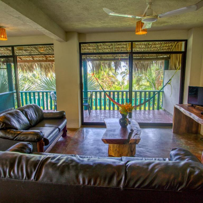 Bungalows Oasis - Suite Deluxe con cama extragrande - 5