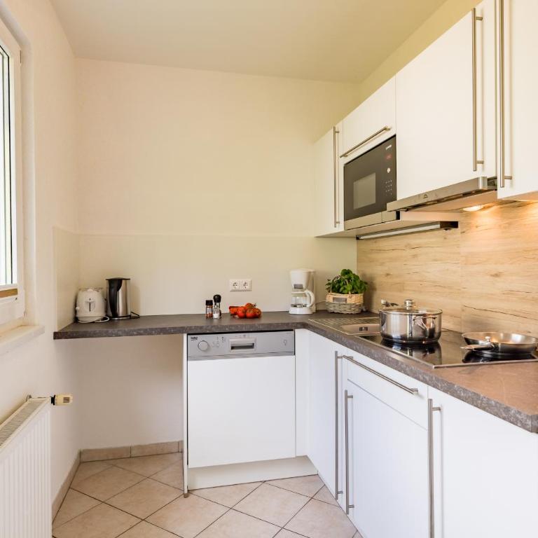 Ferienhäuser Tröster - Apartment mit 1 Schlafzimmer und Terrasse - 2