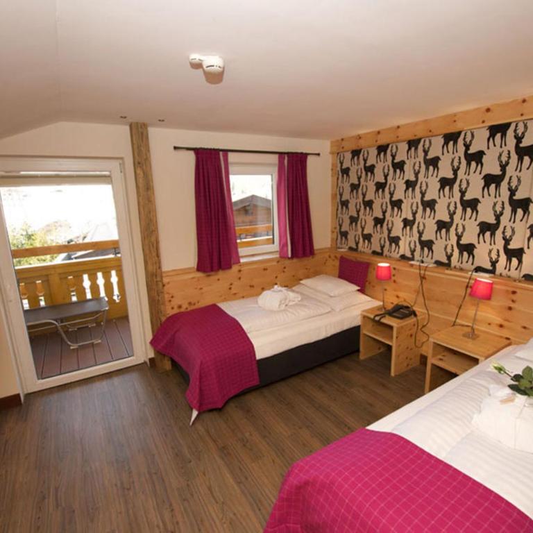 JUFA Alpenhotel Saalbach - Comfort Suite mit 2 Schlafzimmern - 5