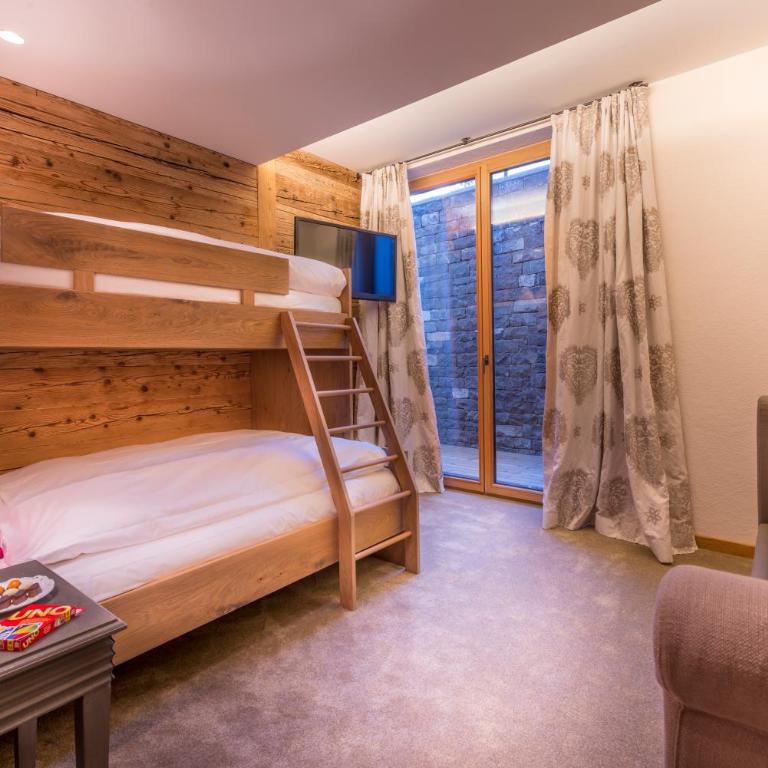 Circle Chalets Arlberg am Golfplatz Ski in - Ski out - Luxus-Suite mit 2 Schlafzimmern - 2