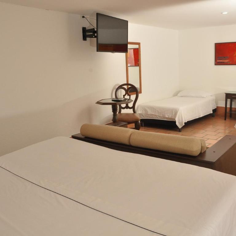 Chrisban Hotel Boutique - Habitación Cuádruple Deluxe - 3