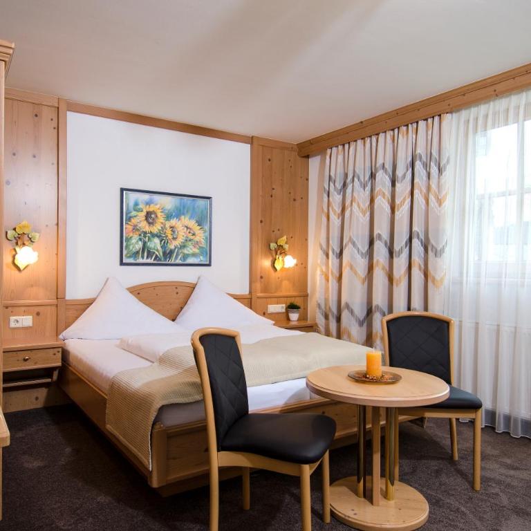 Hotel Garni Subretta - Deluxe Dreibettzimmer - 1