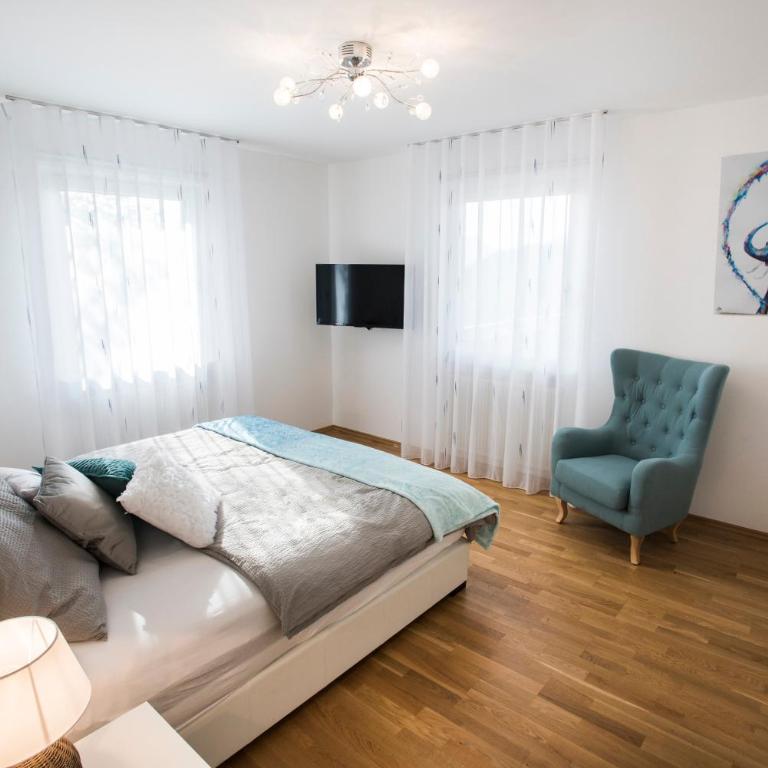 Große Ferienwohnung mit Seeblick nahe Wörthersee Ideal für Familien & Gruppen - Deluxe Apartment mit 3 Schlafzimmern, Terrasse und Seeblick - 14