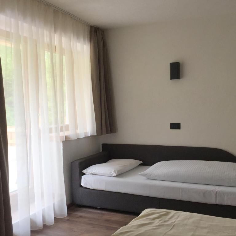 Guesthouse Rungg - Camera Tripla Superior - 7