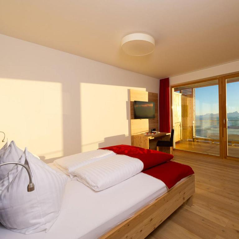 Alpinhotel Pacheiner - Apartment mit 2 Schlafzimmern, einem Balkon und Bergblick - 5